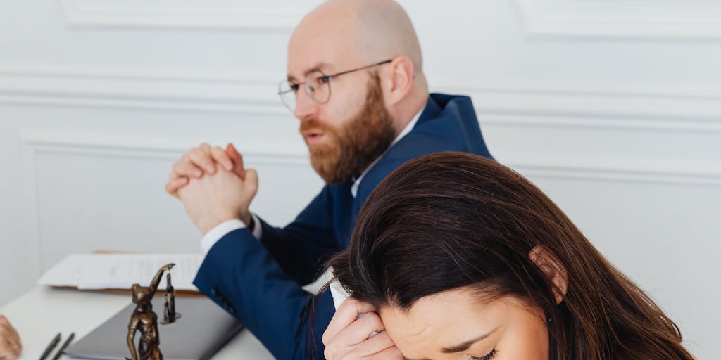 A split image showing two contrasting scenes: on one side, a person looking stressed and overwhelmed in a cluttered home environment, and on the other side, the same person confidently discussing their case with a divorce lawyer in a well-organized office. This visual representation highlights the emotional turmoil of divorce versus the clarity and support provided by legal representation.