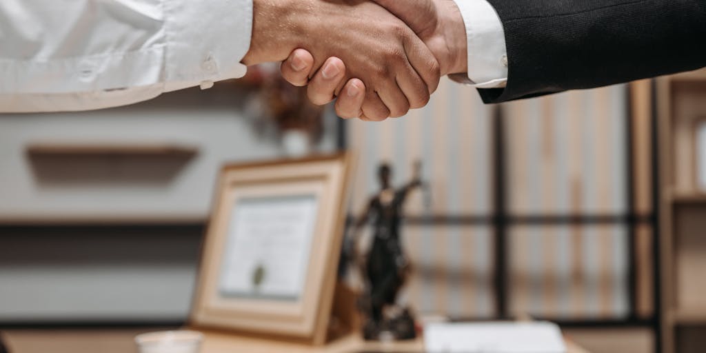 A split image showing a truck accident on one side and a lawyer consulting with a client on the other. This juxtaposition emphasizes the transition from tragedy to legal support, highlighting the lawyer's role in seeking justice.