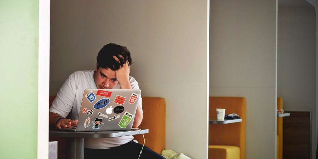 A split image showing a lawyer in a suit on one side, looking stressed while reviewing financial reports, and on the other side, the same lawyer relaxed and smiling while using accounting software on a tablet, illustrating the benefits of technology in law firm management.