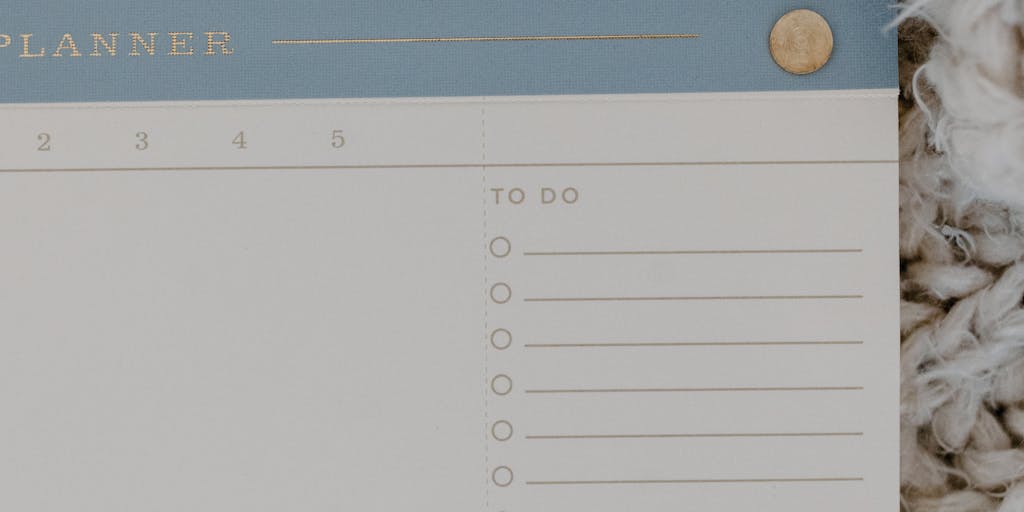 A close-up of a calendar marked with important dates, such as court dates and license renewal deadlines, alongside a checklist of tasks to complete. This visual serves as a reminder to stay organized and proactive in managing one's driving status.