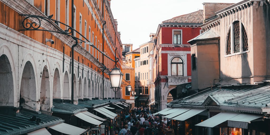 A vibrant street scene in a city that falls under the 866 area code, showcasing local culture. Capture a bustling market with colorful stalls, people interacting, and iconic landmarks in the background. The photo should convey the essence of community and daily life in the area.