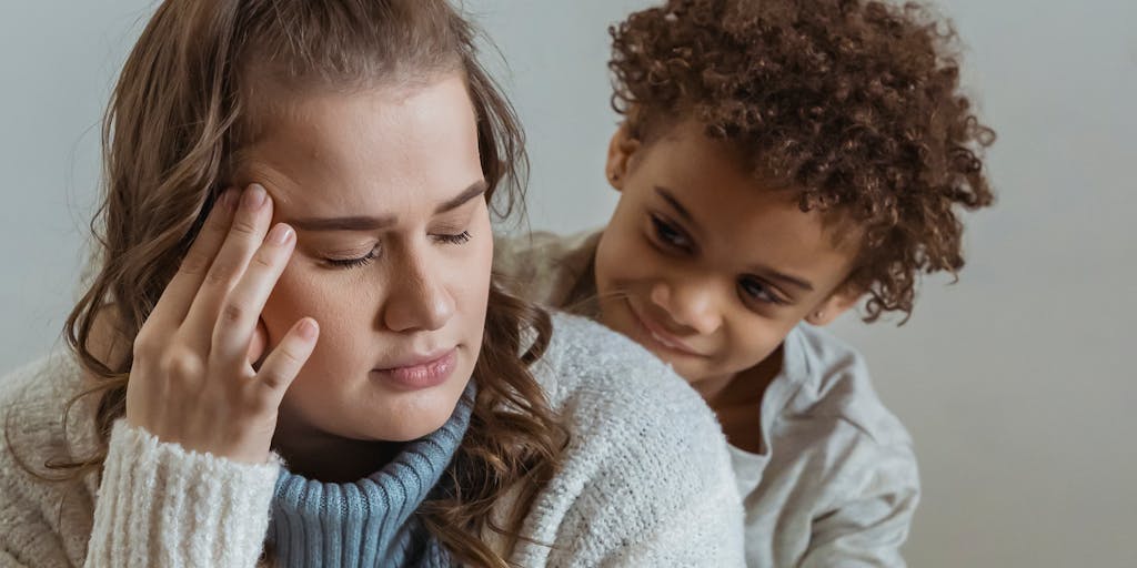 A split image showing two contrasting lifestyles: on one side, a parent enjoying a day out with their child at a park, and on the other side, a parent looking at bills and financial documents at home. This visual representation highlights the financial implications of child support.