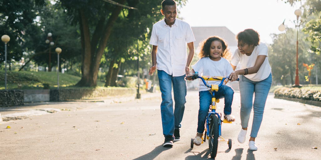 An artistic representation of a scale balancing two elements: on one side, a stack of money representing child support payments, and on the other side, a happy child playing with toys. This image conveys the emotional weight of financial decisions in parenting.