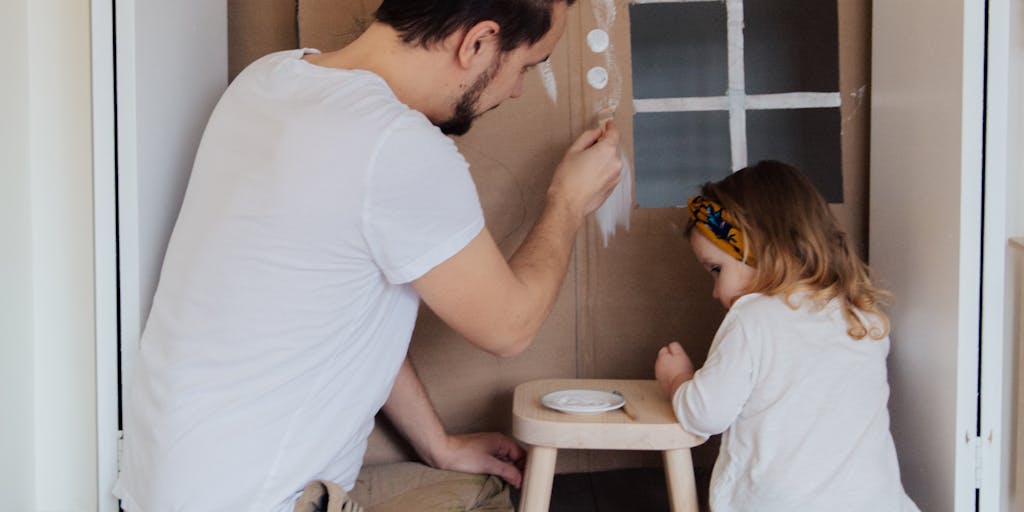 A split image showing two households: one with a happy child playing in a well-furnished living room and the other with a parent looking at bills and a calculator. This visual contrast highlights the impact of child support on family life in Texas.