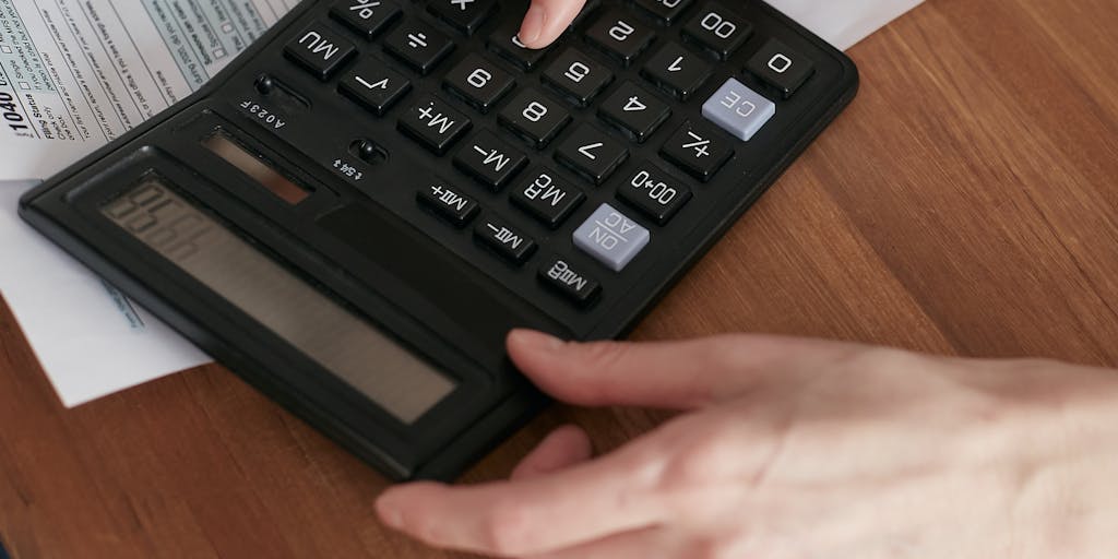 A conceptual photo of a scale balancing a heart and a stack of money, representing the emotional weight of child support decisions. The background could include soft lighting and a blurred image of a family, illustrating the balance between love and financial obligations.