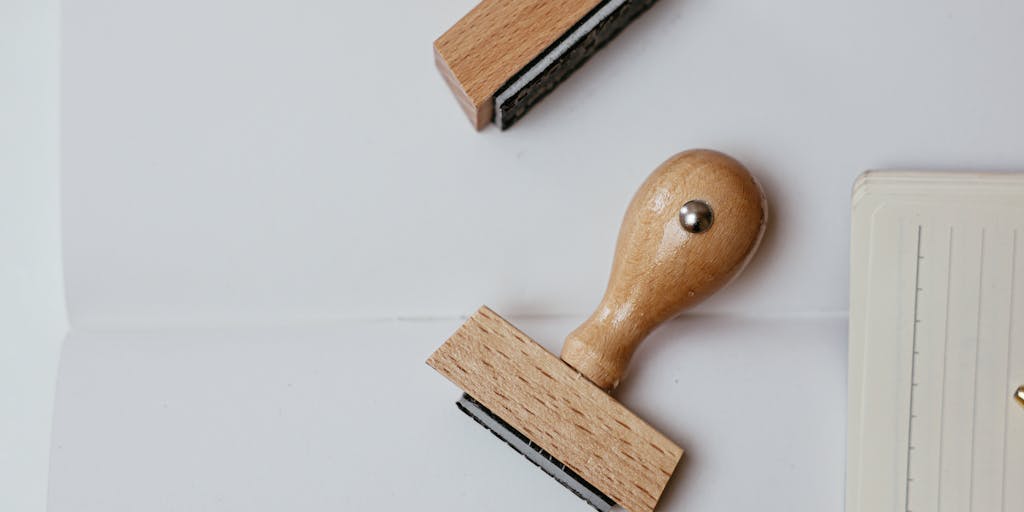 A creative flat lay of various marketing tools and resources, including a printed LeadFuze review, a pen, and colorful sticky notes. The layout is vibrant and organized, symbolizing the planning and strategizing process in lead generation.
