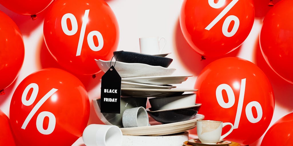 A creative flat lay of a shopping cart filled with colorful items, each tagged with a price sticker. Next to the cart, a tablet displays a digital pricing tool that shows real-time price updates. The composition emphasizes the blend of traditional shopping with modern technology.