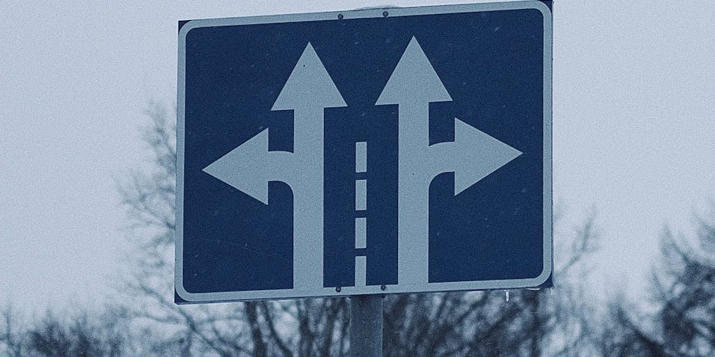 A conceptual image of a person standing at a crossroads, with one path leading to 'Affordable Pricing' and the other to 'Premium Features', illustrated with signs. The person is looking thoughtfully at the signs, symbolizing the decision-making process regarding Mailmeteor's pricing options.