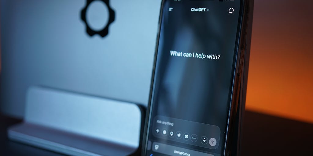A close-up shot of a hand holding a smartphone with a Lavender AI pricing app open, surrounded by fresh lavender sprigs. The screen shows a user-friendly interface with pricing options, highlighting the modern integration of AI and natural elements.