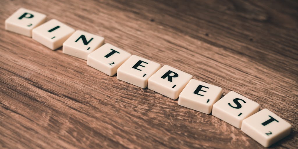 A split image showing a before-and-after scenario: on one side, a dull Pinterest profile with minimal engagement, and on the other, a vibrant, well-curated profile with high engagement metrics. This visual contrast should illustrate the impact of professional Pinterest marketing services.