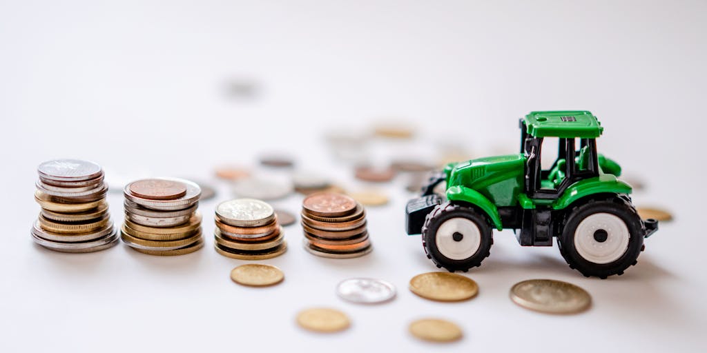 A visual metaphor featuring a scale balancing a stack of money on one side and a child's toy on the other. This image represents the weighing of financial obligations against the emotional and developmental needs of a child.