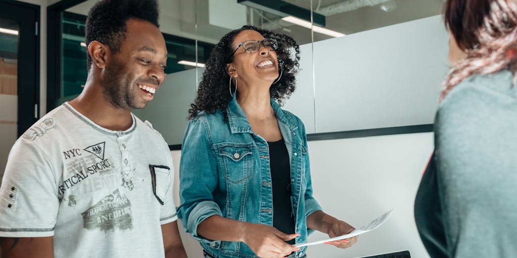 A split image showing two scenarios: on one side, a mother discussing with a lawyer in an office, and on the other side, a father looking at job listings on his phone at home. This juxtaposition highlights the different paths in the child support process.