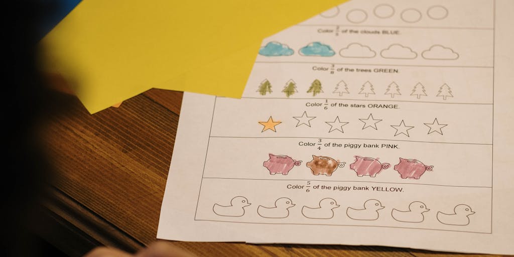 A close-up shot of a hand holding a calculator with bills and a child’s drawing in the background, representing the financial calculations and emotional aspects of managing child support payments.
