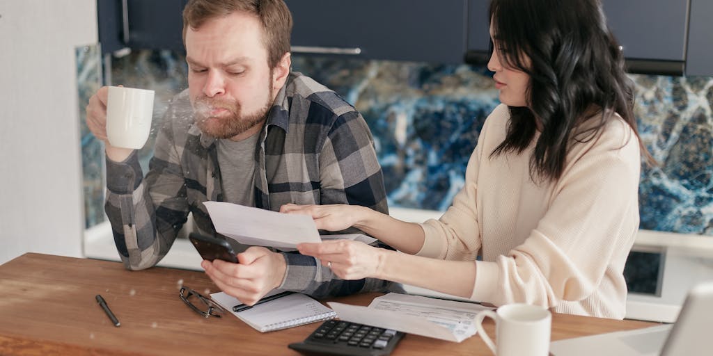 A split image showing two contrasting scenes: on one side, a parent happily receiving a child support check, and on the other side, a tax form with a question mark over it. This visual representation highlights the confusion surrounding taxes on child support.