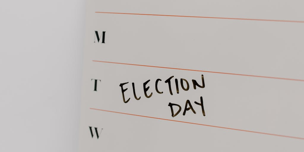 A close-up shot of a calendar page marked with the date of a child's 18th birthday, surrounded by various documents related to child support. This image symbolizes the transition point and the legal implications that come with reaching adulthood.