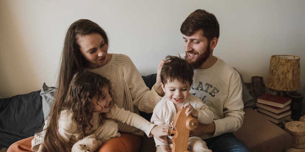 A split image showing a father on one side looking distressed while holding a child’s toy, and on the other side, a stack of bills labeled 'Child Support'. The contrasting emotions highlight the financial burden and emotional toll on fathers.