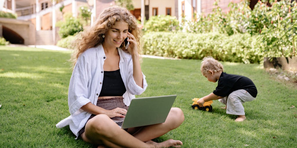 A split image showing a parent working at a desk with bills and a child playing in the background, capturing the dual focus of earning a living while supporting a child.