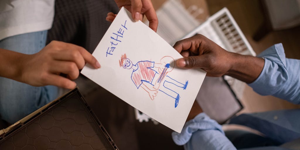 A split image showing two paths: one leading to a graduation cap and the other to a child's drawing. The left side represents the end of child support at graduation, while the right side symbolizes ongoing support for younger children. The background features a clock to signify time.