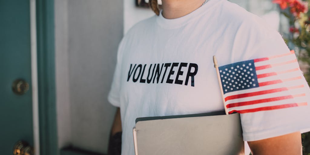 A close-up shot of a calculator, a notepad with child support calculations, and a Texas flag in the background. This image conveys the practical side of determining child support amounts, showcasing the financial planning involved.